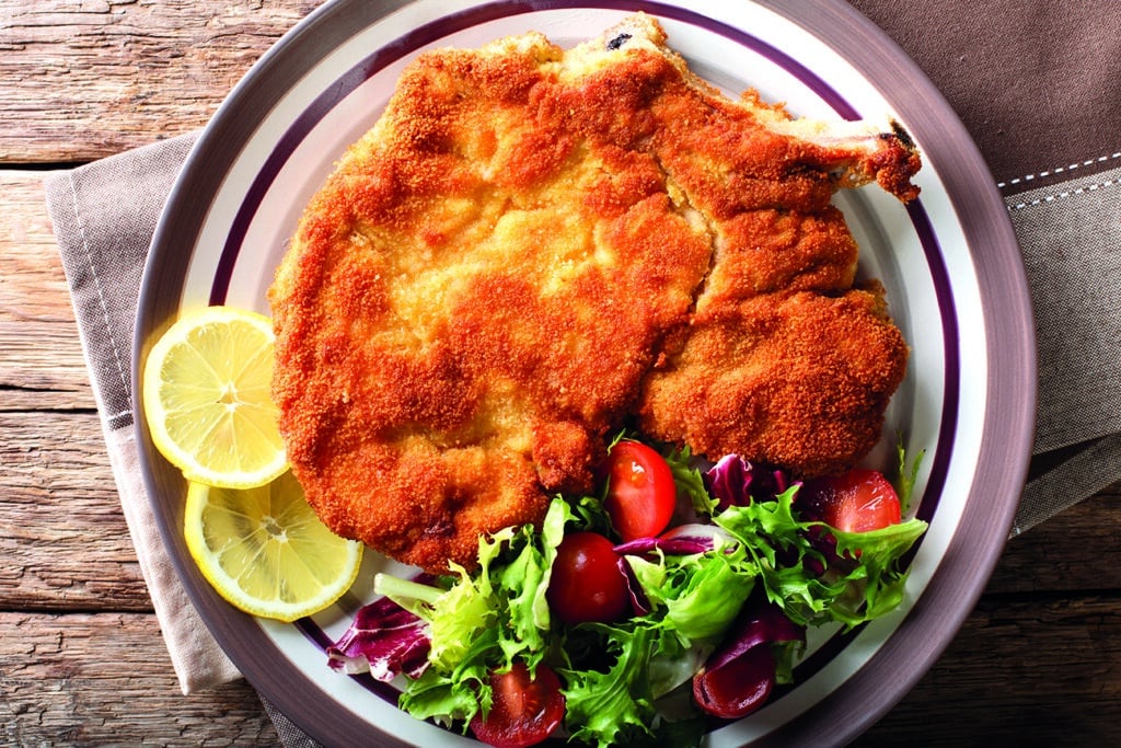 veal milanese (cotoletta alla milanese) with lemon and fresh veg