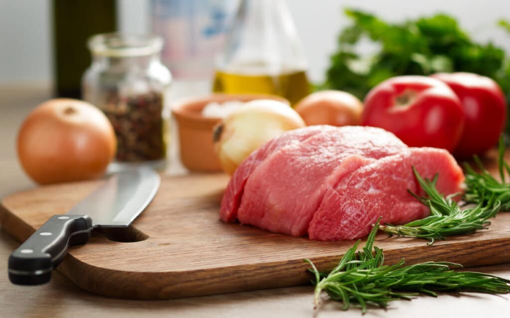 raw beef on cutting board